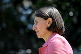A profile view of Gladys Berejiklian at a press conference