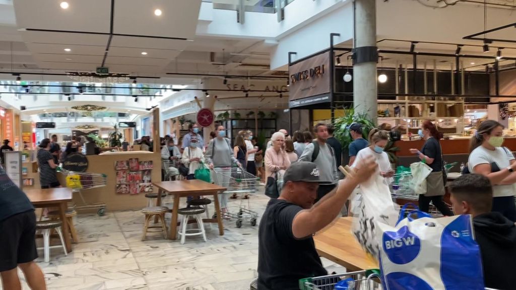 People Line Up To Enter Stores In Warringah Mall Abc News