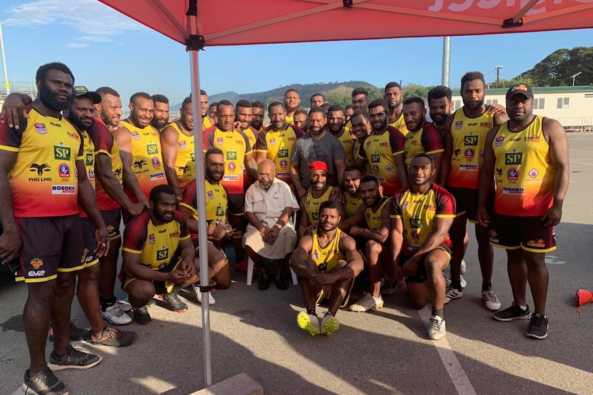 The Hunters team players and staff with Grand Chief Sir Michael Somare in 2019.