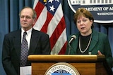 US officials Ann Veneman and Bill Hawks brief reporters on the mad cow discovery.