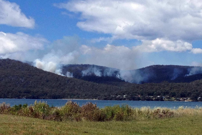 Smoke from a bushfire at Fluted Cape, Bruny Island