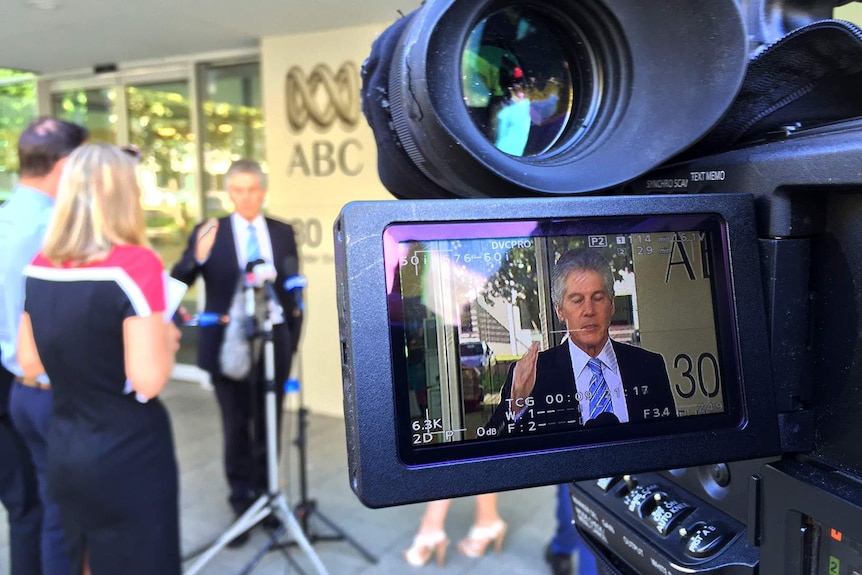 A camera viewfinder shows former federal Labor minister Stephen Smith being interviewed outside ABC Perth.