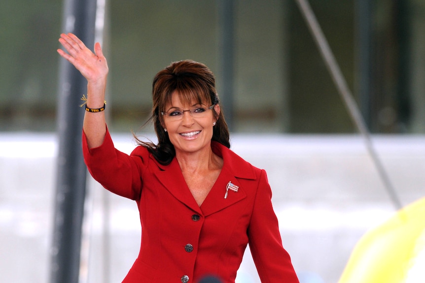 Sarah Palin waves