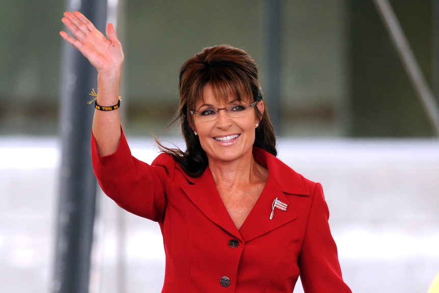 Former Alaska governor Sarah Palin prepares to speak at a Tea Party Express rally
