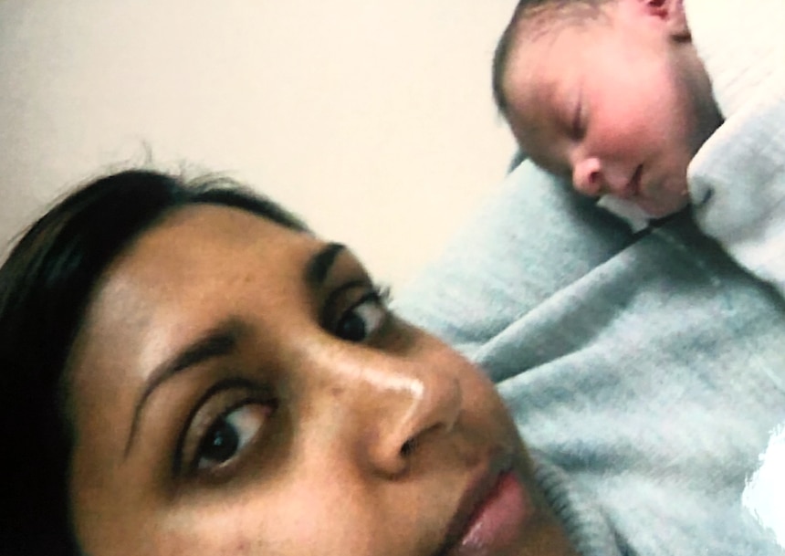 A close up of a woman's face next to a tiny baby for a story on bringing premature babies home. 