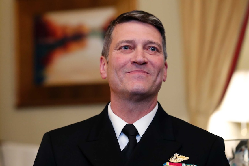 Ronny Jackson smiles as he looks into the distance.
