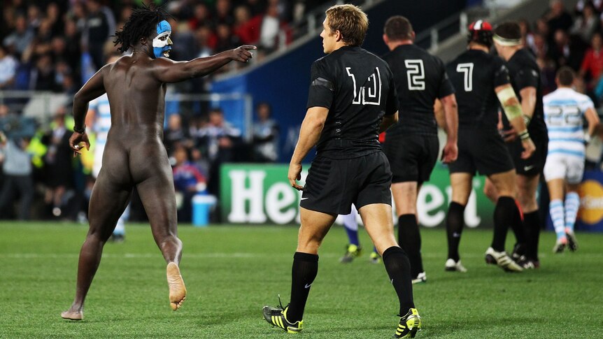 Streaker with Argentina face paint taunting England fly half Jonny Wilkinson