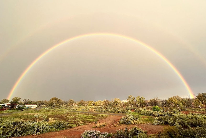 A double rainbow in the outback after rain.