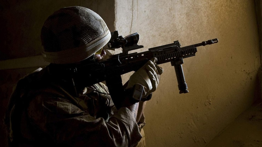 Royal marine in action in Afghanistan