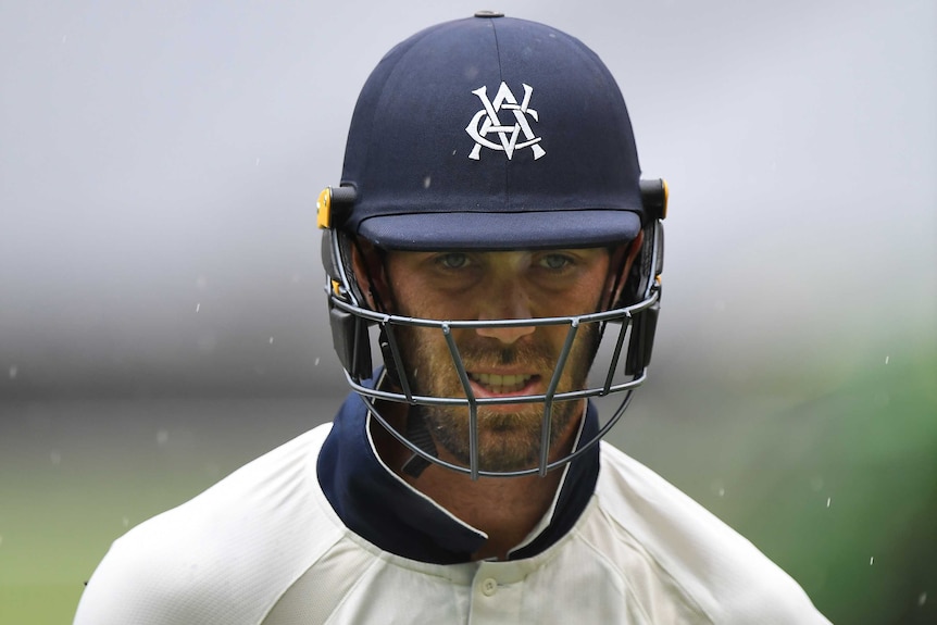 Glenn Maxwell walks off the MCG during a rain delay in the Victoria vs Tasmania Sheffield Shield match.