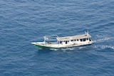 A boatload of asylum seekers that was intercepted north of Darwin.