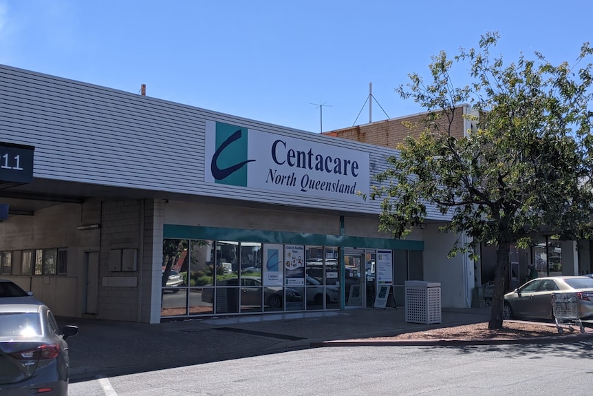 A building with the sign 'Centacare' 
