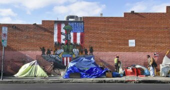 Homeless people camping on the street.