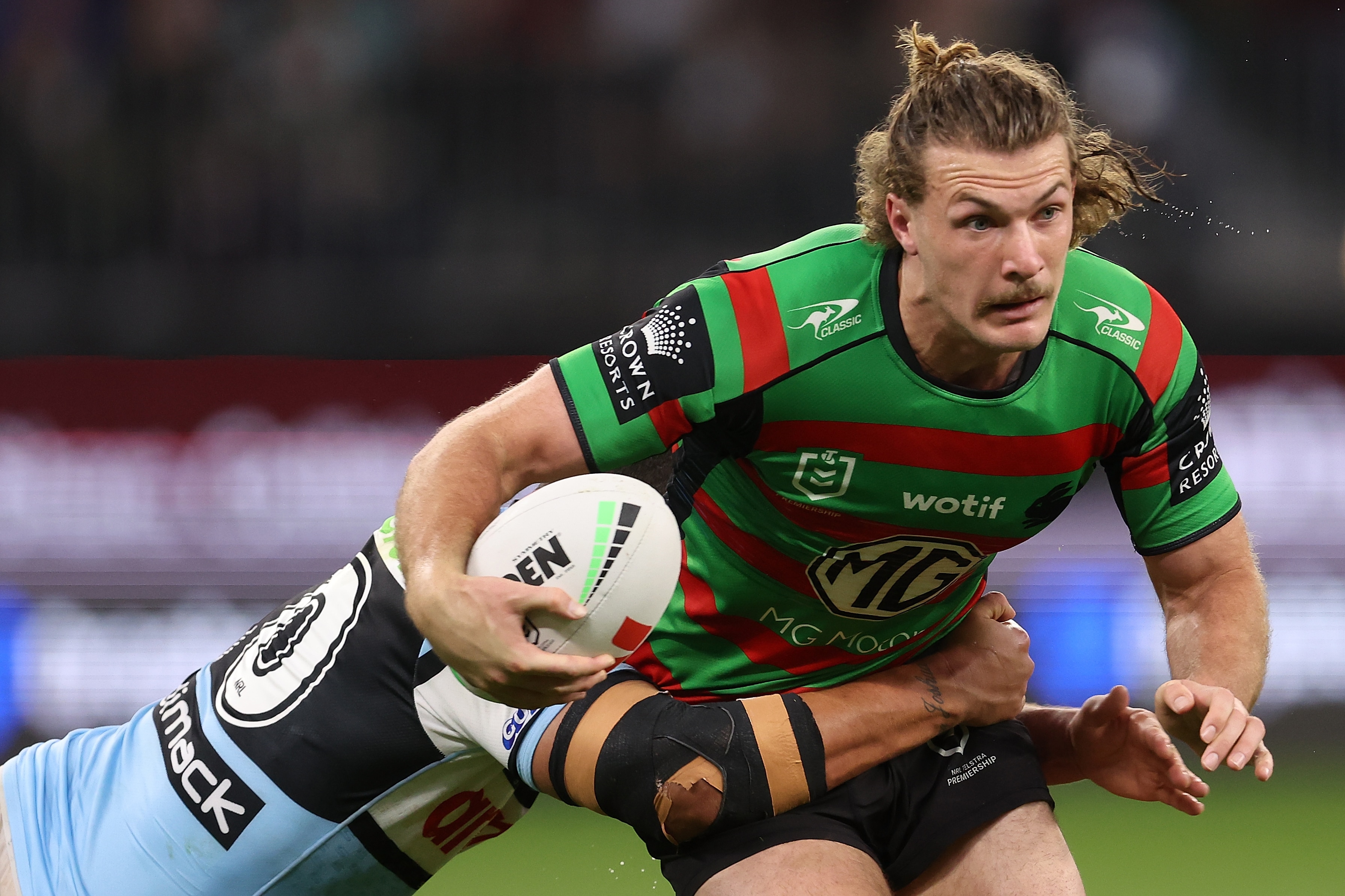 Campbell Graham holds the ball with his right hand during a 2023 NRL match.