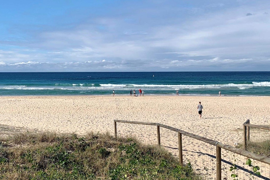 A beach on the Gold Coast with people on the beach