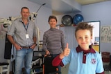 Physio Justin Griffiths, with Kim Anderson and her son Rusty Gielis