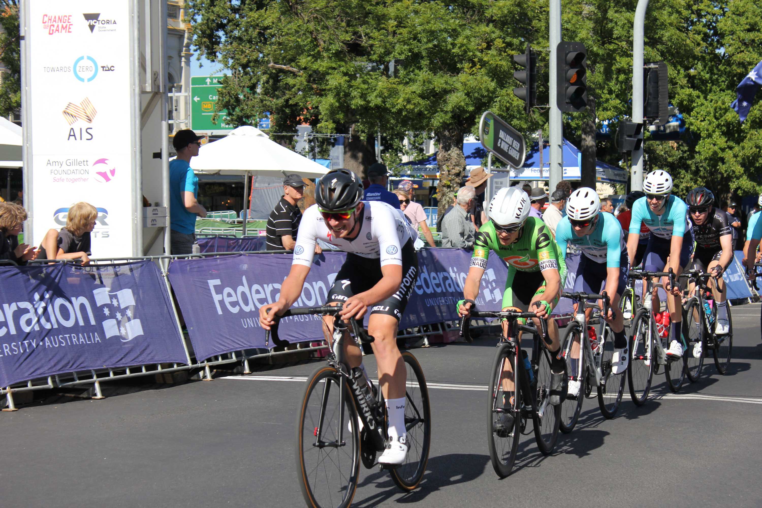 6 cyclists crossing the line at a cycling race in Ballarat
