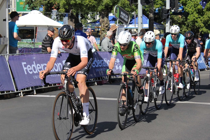 6 cyclists crossing the line at a cycling race in Ballarat