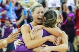 Queensland Firebirds celebrate after winning trans-Tasman netball grand final against NSW Swifts.