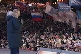 Putin celebrates election victory at a rally in Moscow