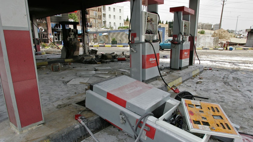 Anger: A petrol station was set on fire in Tehran after the rationing was announced.