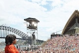 Oprah Winfrey addresses her fans outside the Sydney Opera House