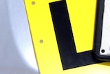 'L' plate on a car