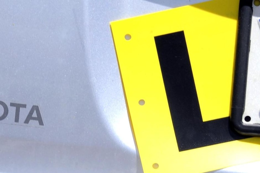 L plate on a car.