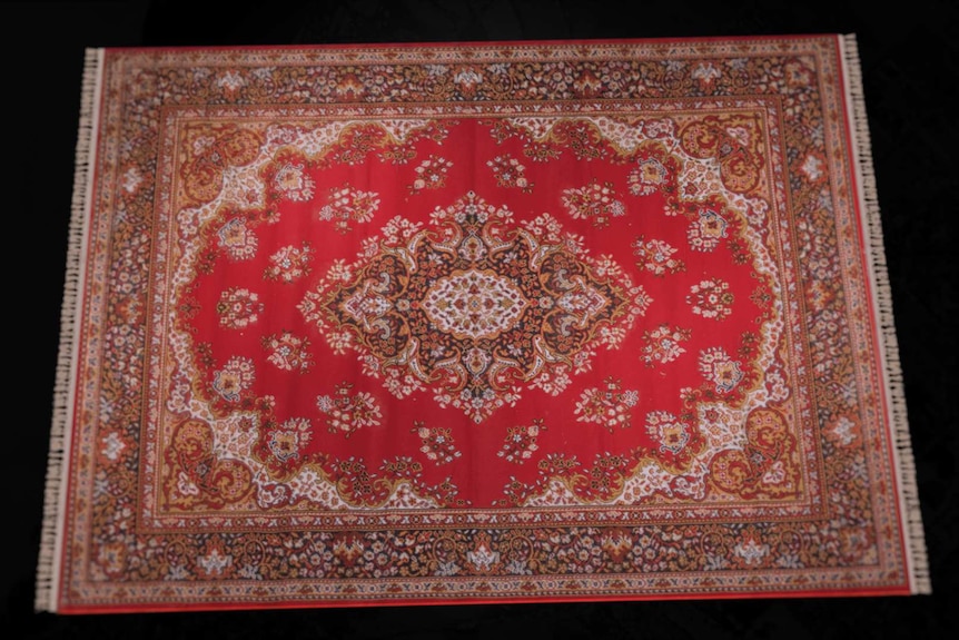 A red Persian rug.