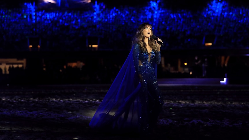 Delta Goodrem performs during the opening ceremony.