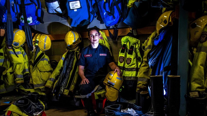 Female firefighter in station