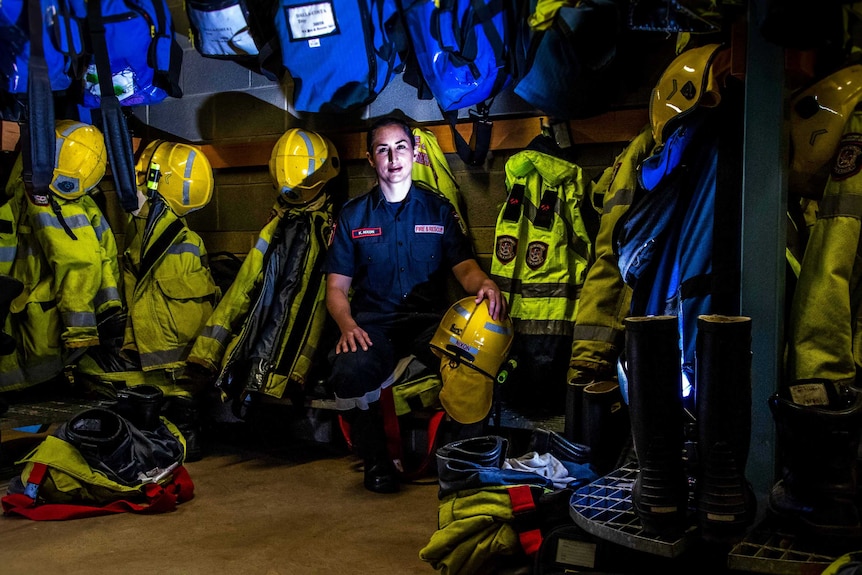 Female firefighter in station