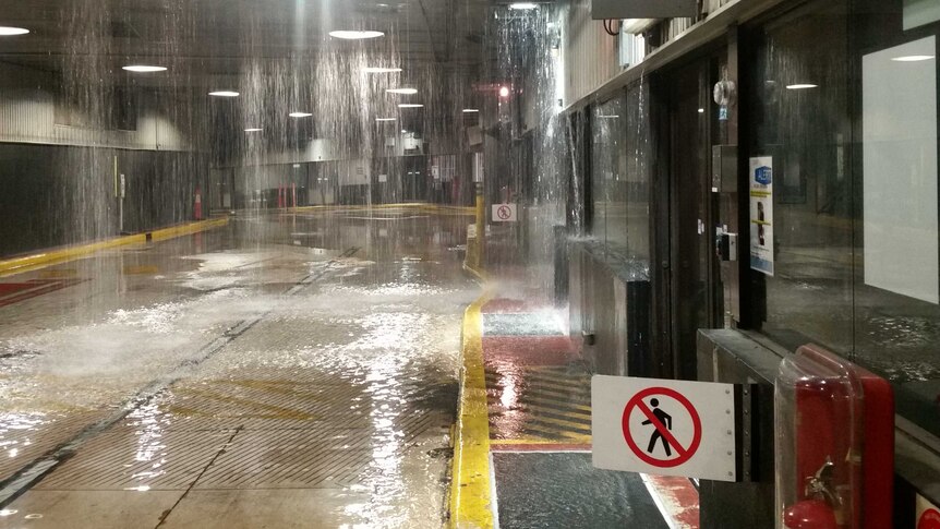 A burst water main causes flooding at the Queen Street bus station