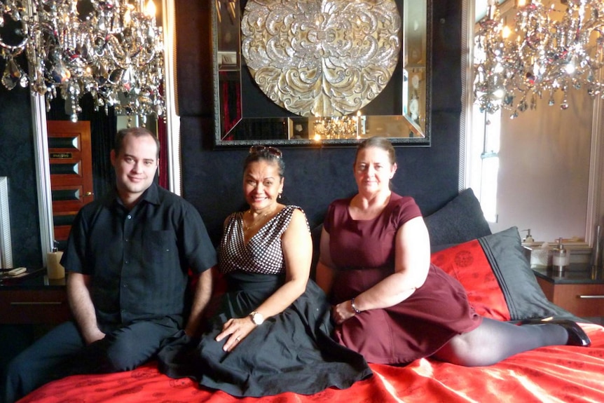 Manager Aaron, sex worker Jacquie and receptionist Keryn inside a Canberra brothel.