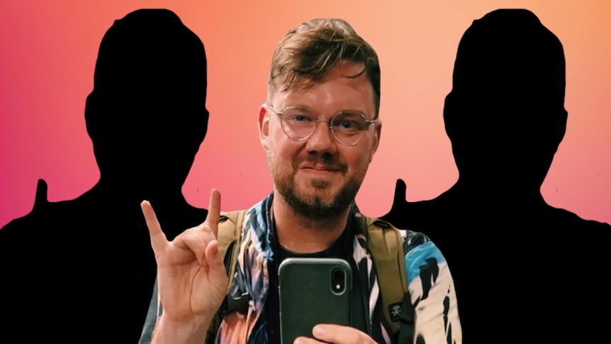 Tim Shiel with the 'rock' finger symbol in front of a gradient pink background.