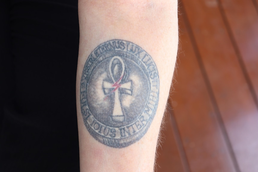 A round tattoo on a woman's arm. For a story on getting a memorial tattoo after the loss of a son. 