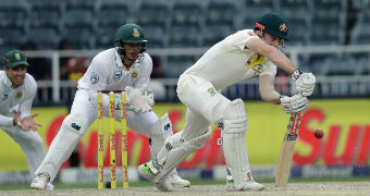 Shaun Marsh blocks the ball.