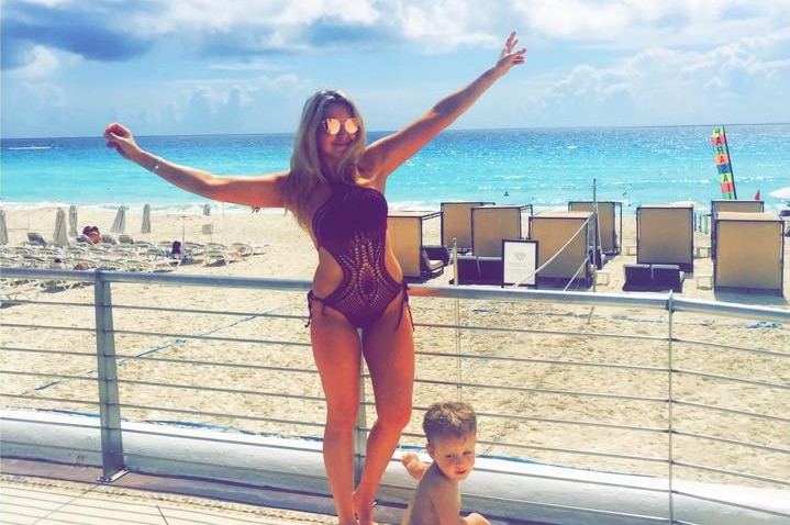 Eryn Ford with her son at the beach