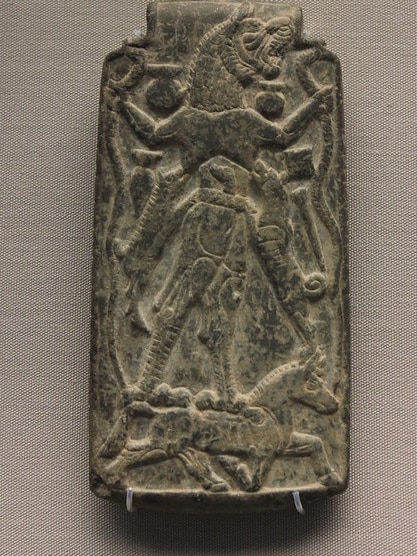 An image of an amulet that was used to ward off Lamashtu. Dogs can be seen on either side of her teats.
