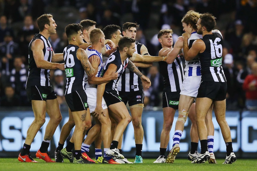 North Melbourne and Collingwood scuffle