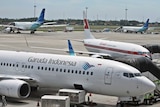 Garuda Indonesia planes parked at the main international airport serving Jakarta.