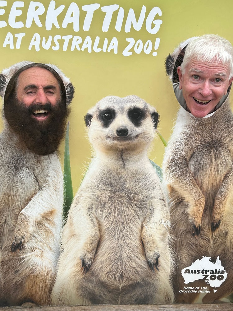 Costa and Mick at the Meerkat picture cut out booth at Australia Zoo