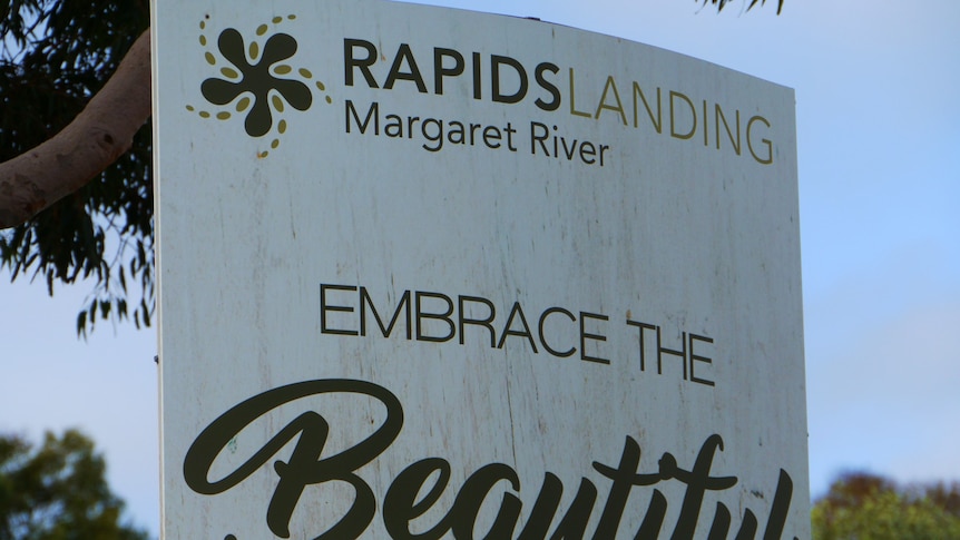 A sign that says Rapids Landing, embrace the beautiful Margaret River