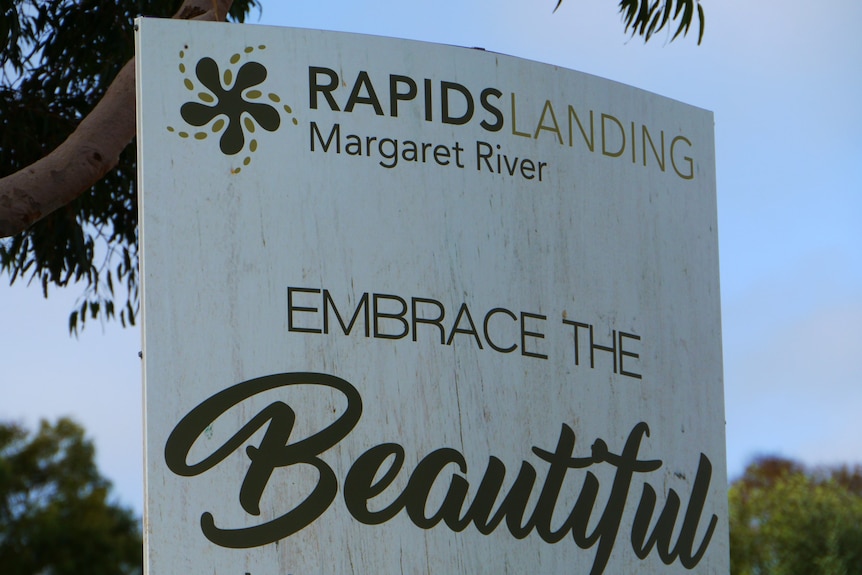 A sign that says Rapids Landing, embrace the beautiful Margaret River