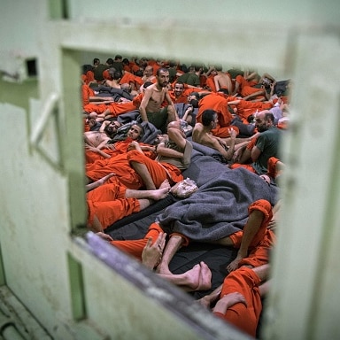 ISIS prisoners in a cell in northeastern Syrian