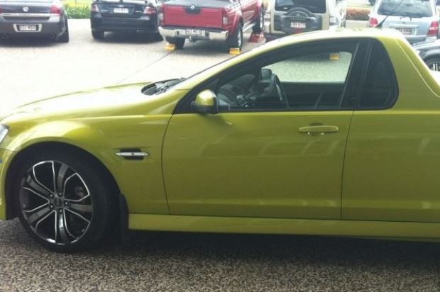 A green Holden ute.
