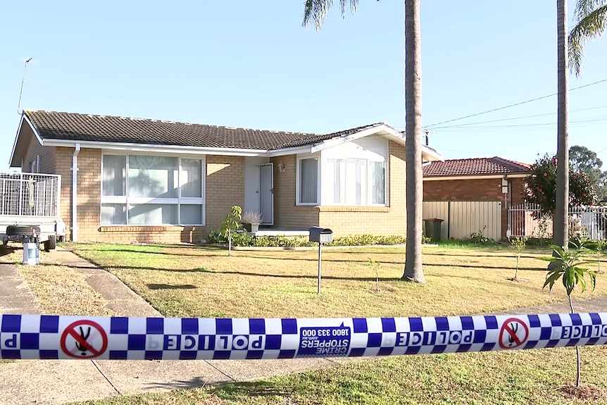 police tape around a property in Rooty Hill