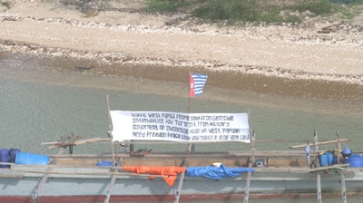 The banner on their boat accused Indonesia of committing genocide (file photo).