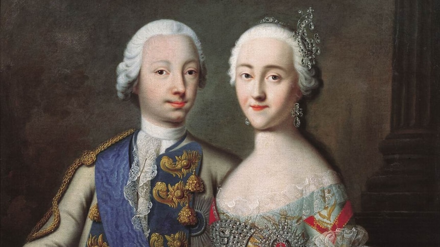 An old painting of a regally-attired girl and boy, sitting, smiling and both wearing white wigs.