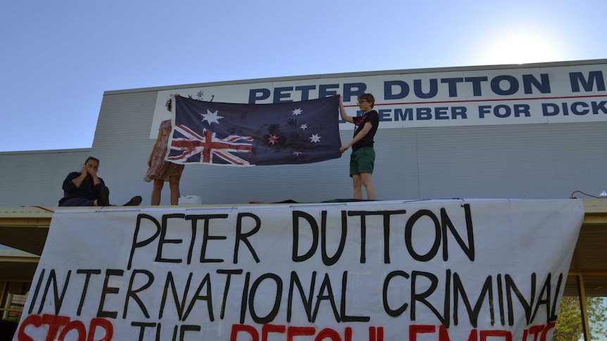 Protest on the roof of Peter Dutton's office